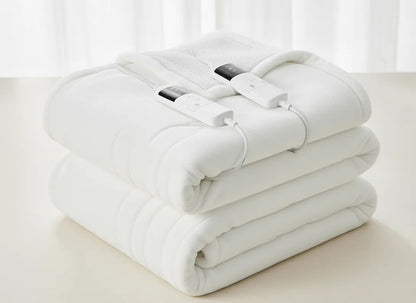 Cozia™ - Couverture Chauffante Flanelle & Sherpa